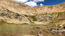 Herman Lake near the top with a rugged Mountain backdrop. Herman Gulch, Colorado. September, 2018.